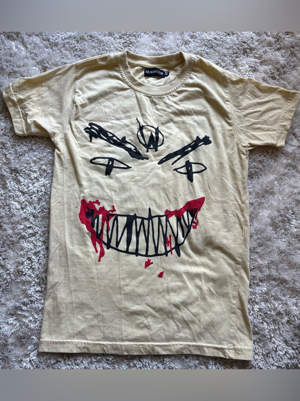 Evil Hearts Club Graphic Tee in Light Beige with Black & Red Print
